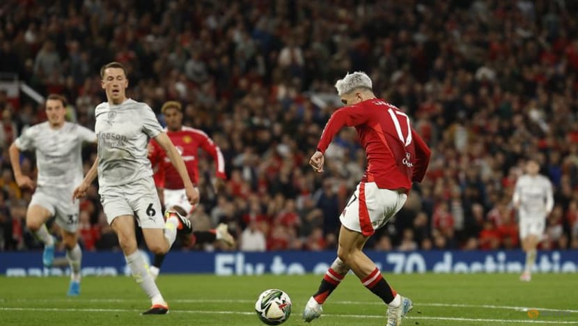 Manchester United put seven goals past Barnsley to progress in League Cup