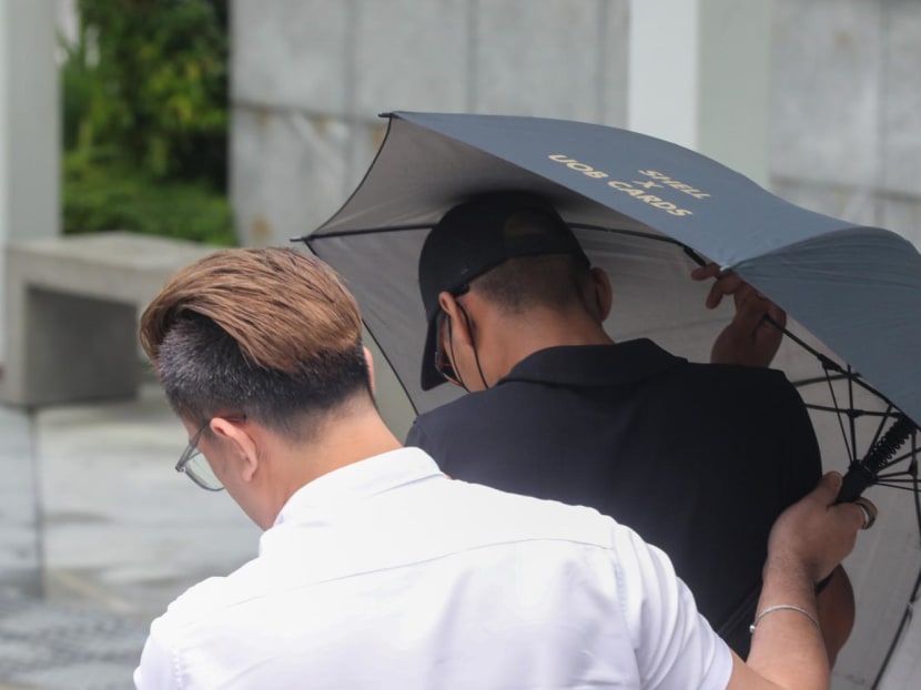 Muhammad Nurul Hakim Bin Mohamed Din (in black) at State Courts on Jan 15, 2024.