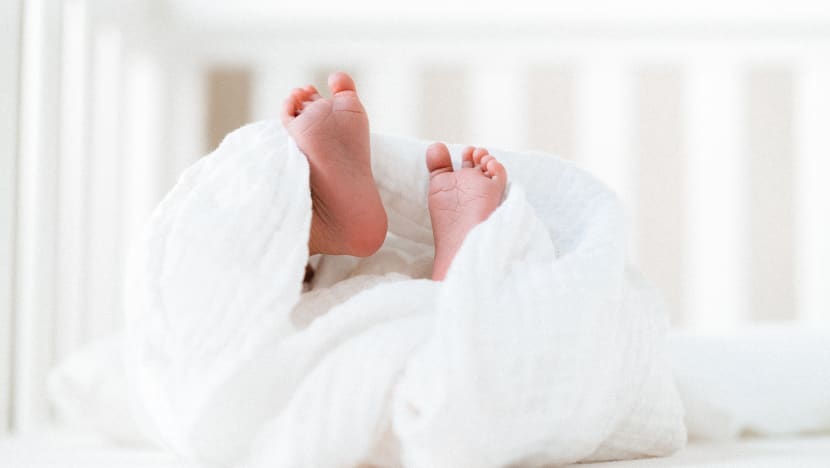 Open verdict on death of 3-week-old baby who fell asleep in arms of dozing confinement nanny