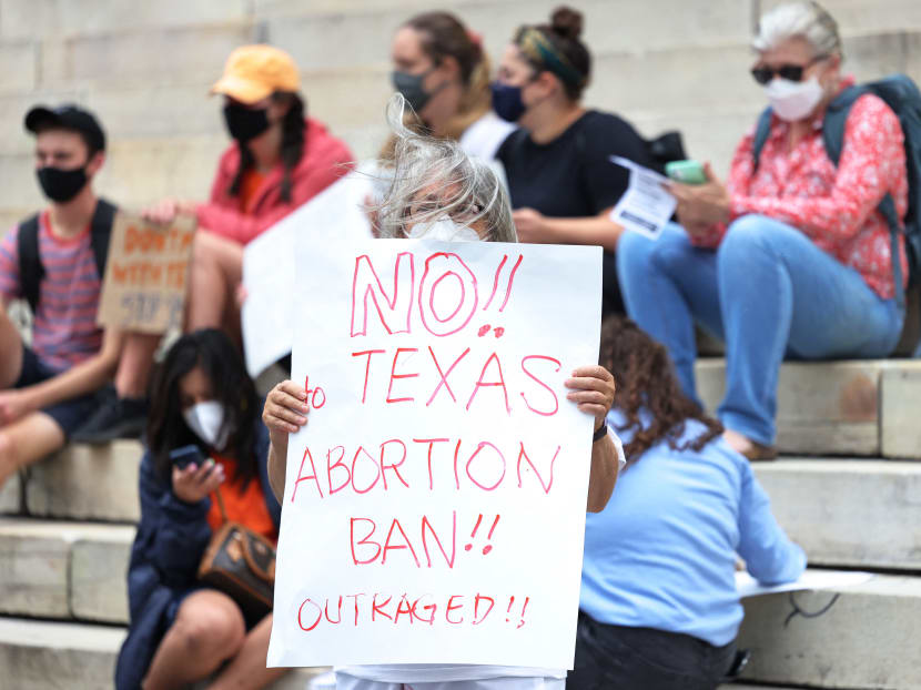 A protestor holds up a sign at a reproductive rights rally at Brooklyn Borough Hall in New York on Sept 1, 2021.