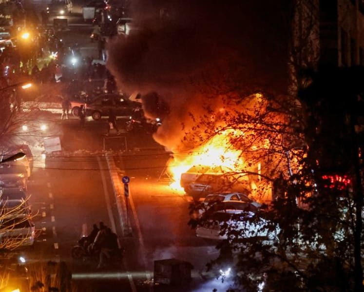 At least 5,000 dead in Iran unrest, official says, as judiciary hints at executions