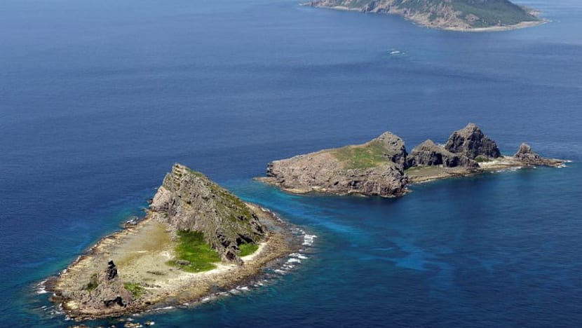 Japan, China coast guards face off near disputed islands