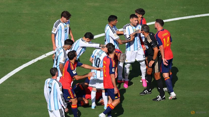 Spain battle past 10-man Argentina 1-0 in extra time to win World Cup