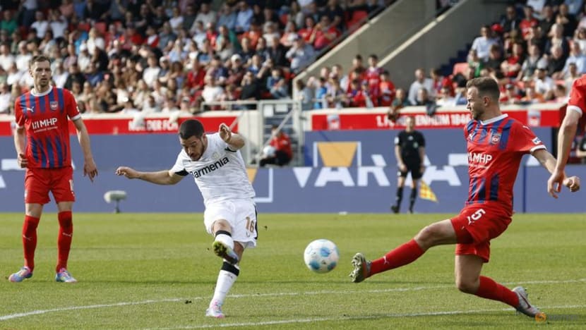 Bayer Leverkusen grab late winner against Heidenheim to keep title hopes alive Bayer Leverkusen grab late winner against Heidenheim to keep title hopes alive