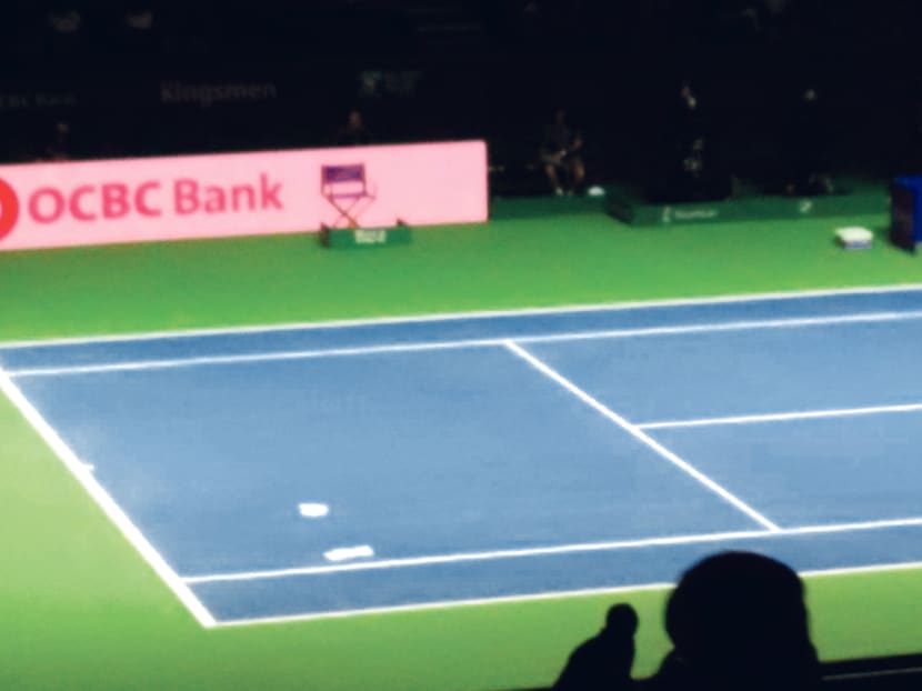Yesterday’s roof leak occurred during a WTA Finals women’s doubles quarter-final match. Photo: Low Lin Fhoong