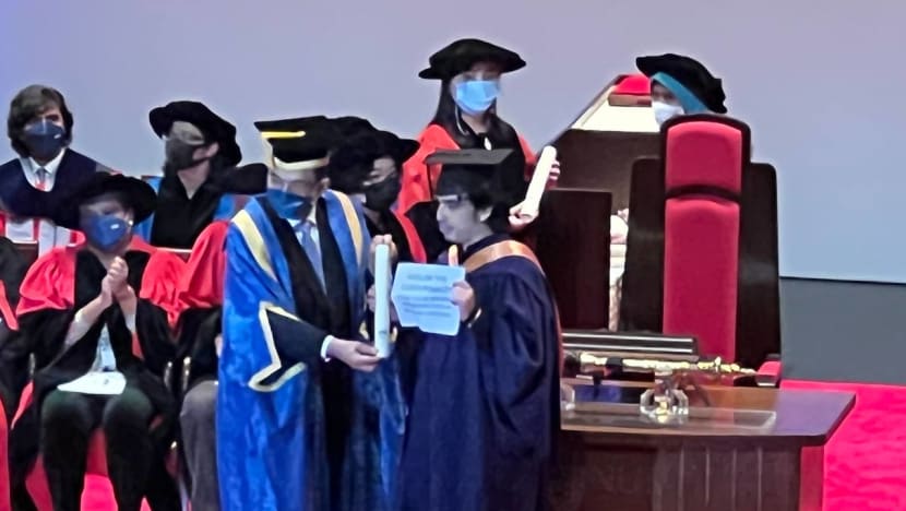 Police issue written advisory to NUS grad who held up anti-death penalty sign 