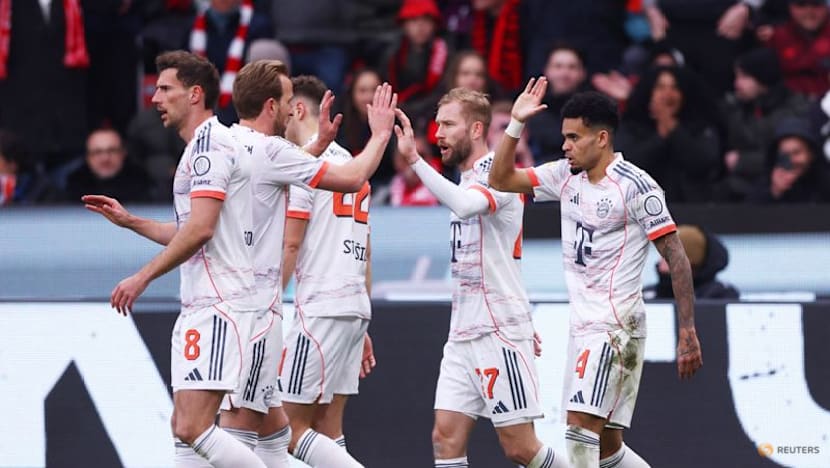 Nine-man Bayern come from behind to rescue 1-1 draw at Leverkusen
