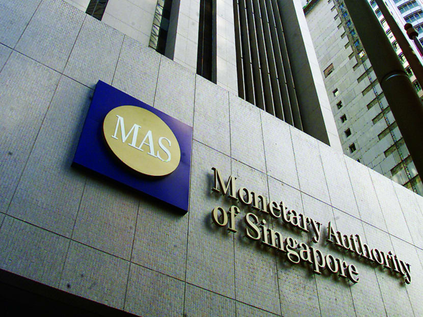 The MAS has penalised 22 financial institutions over the past three years for failing to comply with rules to prevent money laundering and terrorism financing. TODAY file photo