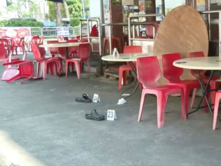 A pair of slippers marked as evidence at a coffee shop at Verdun Road on Sept 22, 2024.
