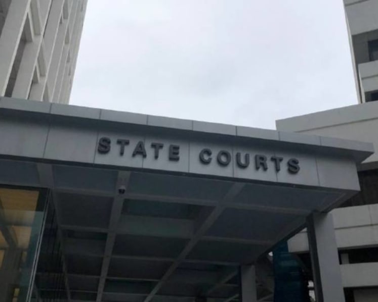Caregiver charged with abusing bedridden elderly woman, stepping and kneeling on her chest