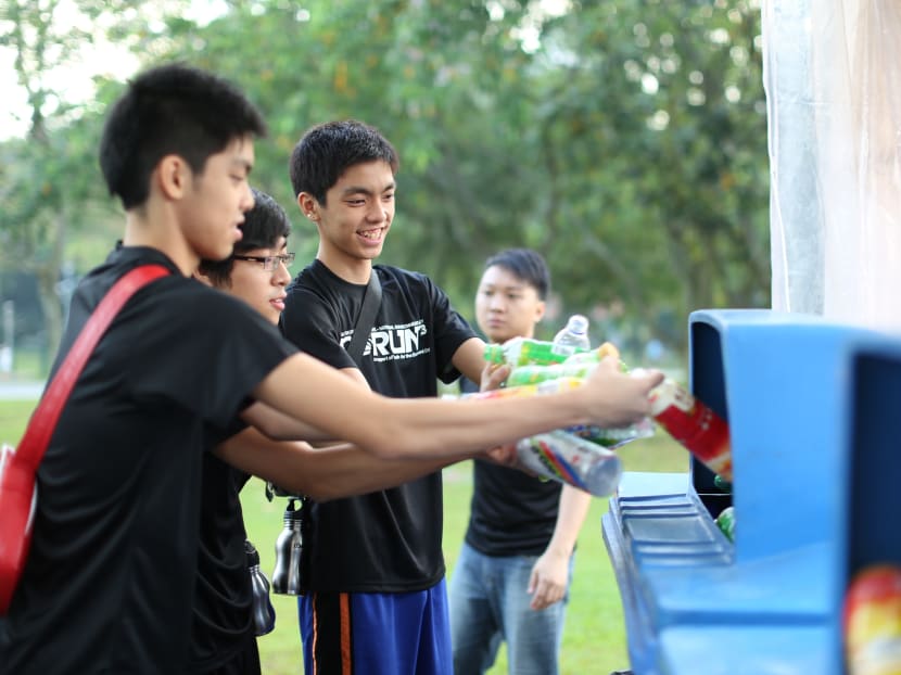 Students sort plastic bottles for recycling. Photo: National Geographic Channel