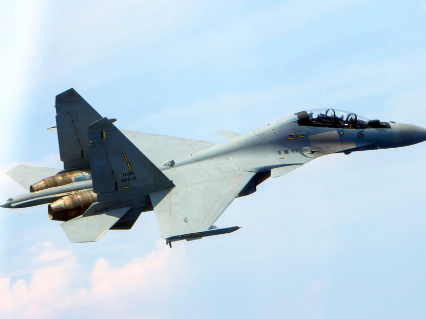 This May 10, 2015 US Navy handout photo shows a Royal Malaysian Air Force SU-30MKM/Flanker H, flying above the aircraft carrier USS Carl Vinson (CVN 70) operating in the South China Sea during a bilateral exercise aimed at promoting interoperability with the Malaysian Royal Military. This May 10, 2015 US Navy handout photo shows a Royal Malaysian Air Force SU-30MKM/Flanker H, flying above the aircraft carrier USS Carl Vinson (CVN 70) operating in the South China Sea during a bilateral exercise aimed at promoting interoperability with the Malaysian Royal Military.