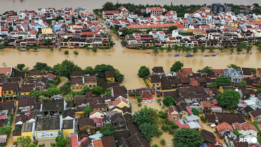 Record Vietnam floods kill 10, turn streets into canals Record Vietnam floods kill 10, turn streets into canals