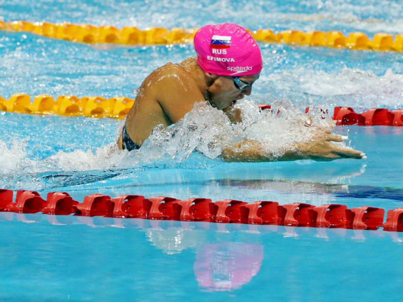 On the first day of the Singapore leg of the Fina/airweave Swimming World Cup yesterday, Yulia Efimova took a silver in the 100m breaststroke (1:03.21), and a bronze in the 200m individual medley (2:08.17). Photo: Ooi Boon Keong