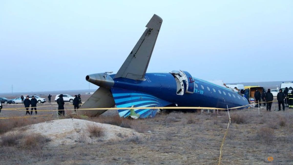 Passenger on crashed plane says there was at least one loud bang before it went down