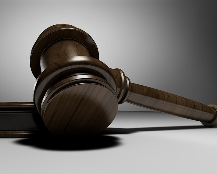 Woman, 21, pleads guilty to failing to report rape of unconscious friend, opening bank accounts for scammers
