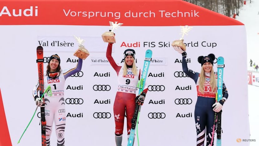 Alpine skiing-Huetter clinches first World Cup win of season, Vonn finishes third