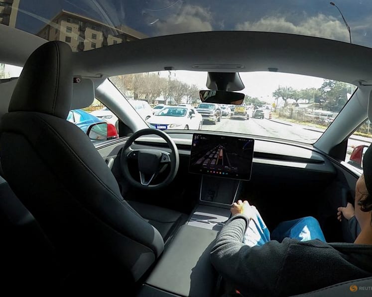 Tesla's once-bullish tone on robotaxis shifts  