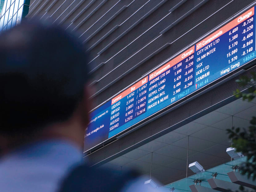 An electronic stock quotation board is seen on the side of a building in the financial district in Singapore, on Friday, Oct. 10, 2008. Bloomberg file photo