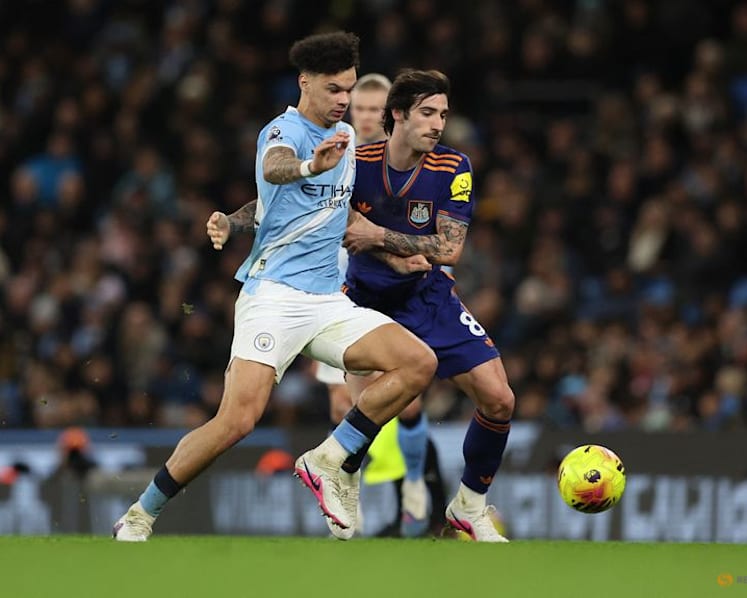O'Reilly double gives Man City win and turns heat on Arsenal