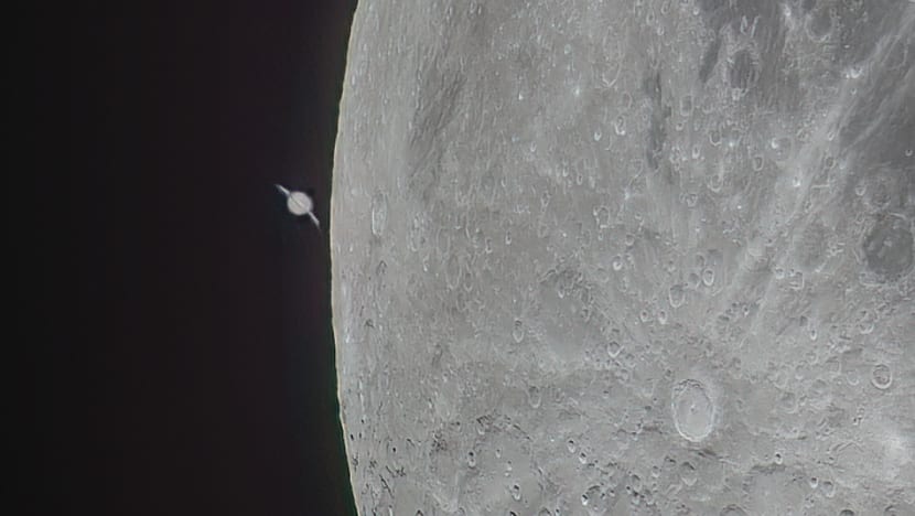 In pictures: Saturn seen cosying up to the moon in rare conjunction In pictures: Saturn seen cosying up to the moon in rare conjunction