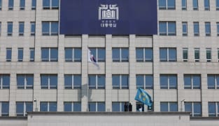 South Korea police raid presidential office and security compound