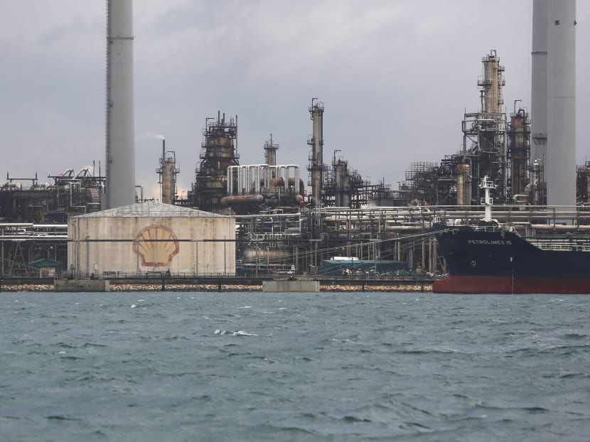 14 out of 20 people have been arrested by the police in connection with a fuel heist have been charged over the theft of gas oil valued at almost S$6.5 million. Eight of the suspects are employees of Shell. Photo: Raj Nadarajan/TODAY