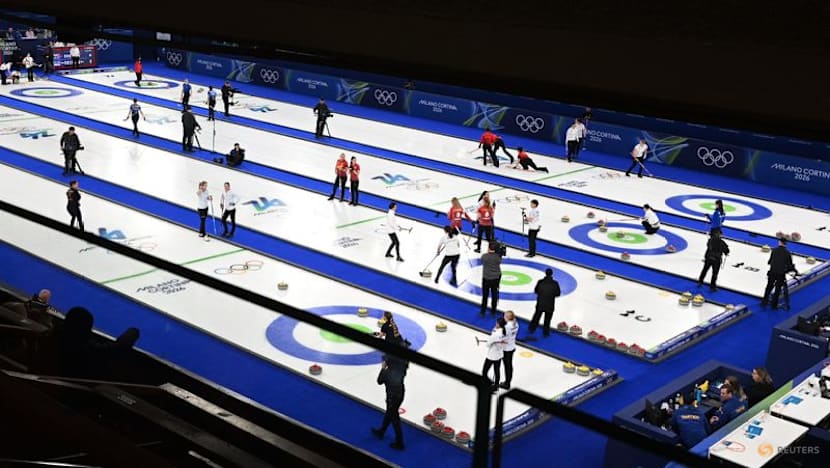Curling-Curlers are loving the noisy fans at Winter Games