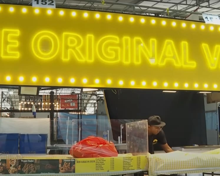 Stall owners set up in spaces apart from Geylang Serai Ramadan Bazaar, as competition for customers heats up