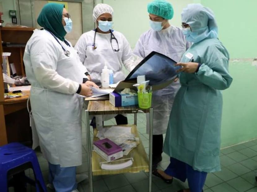 Malaysia healthcare capacity stretched with long waiting times, manpower shortage: Reports
