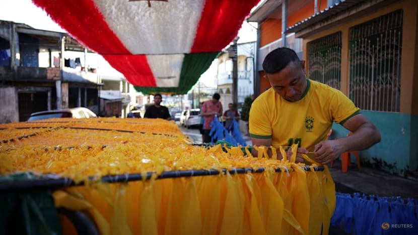 In Rio, artisan crafts World Cup trophies while hoping Brazil gets a real one