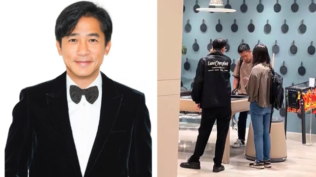 梁朝伟和神秘女子逛街　被认出即戴口罩