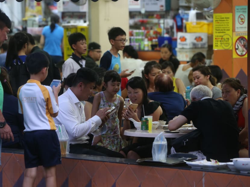Players of Pokemon Go on Aug 11, 2016. Photo: Ooi Boon Keong/TODAY