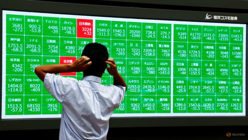 Wall Street tumbles as Fed projects slower rate cuts next year