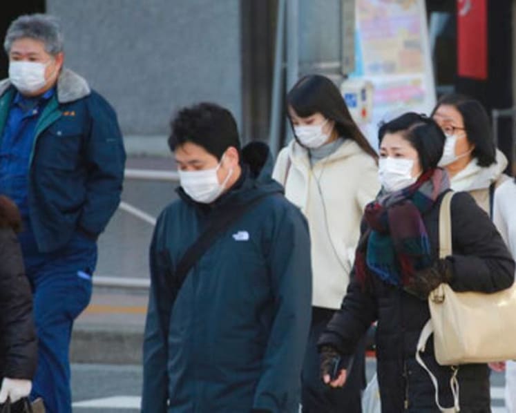 Japan widens COVID-19 emergency for 7 more areas as cases surge