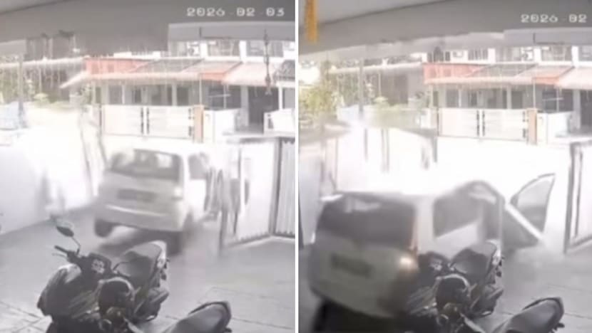Reversing car smashes through neighbour's fence in viral video in Malaysia