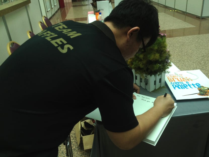 Teen artist raises S$55,000 for charity