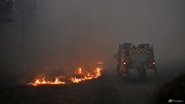 France, Spain race to contain 'monster' fires ahead of new heatwave