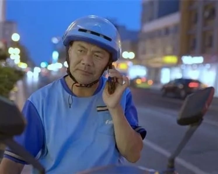 He delivers food by day and pens poetry by night. Now he’s won China’s top literary prize