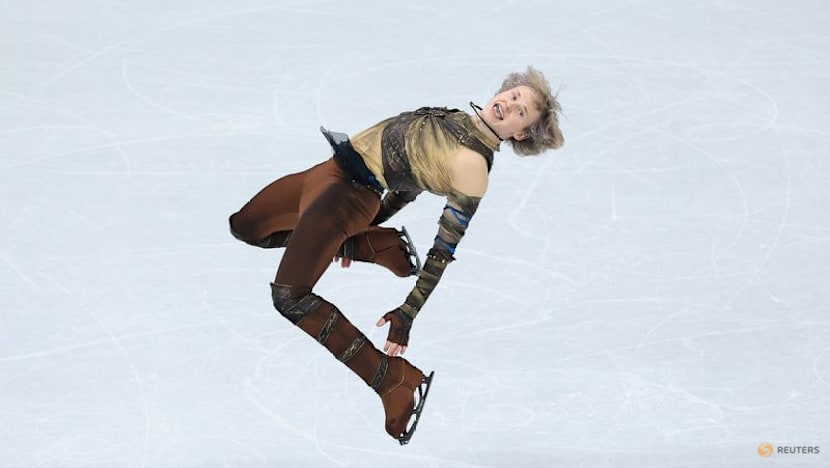 Figure skating-Malinin surges into lead with thrilling short programme
