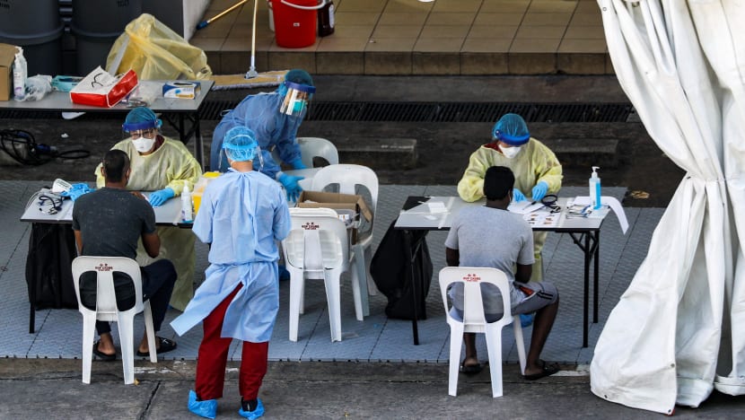 Vaccinated migrant worker among 14 new Covid-19 cases; MOH to monitor re-infection of recovered patients