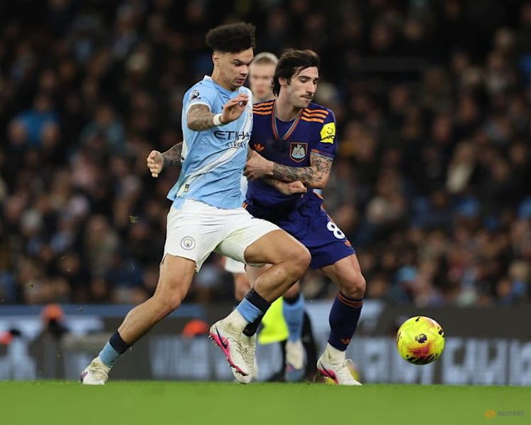 O'Reilly double gives Man City win and turns heat on Arsenal