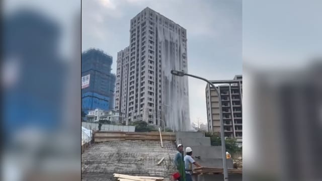 台湾强震一栋高楼游泳池水流溢出成大楼瀑布