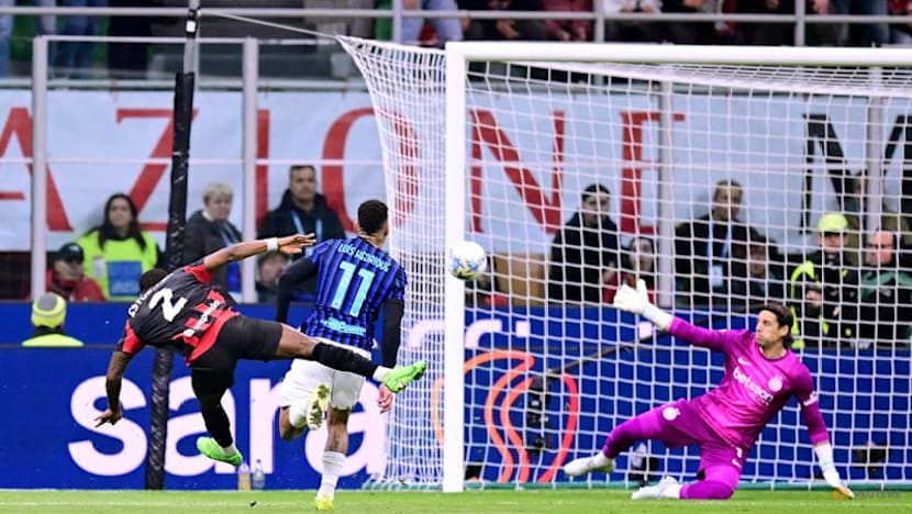 Milan edge Inter in derby to keep distant title chase alive