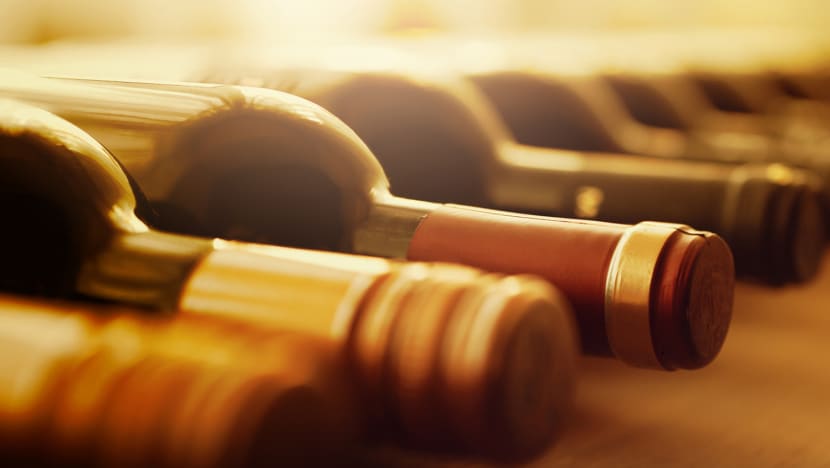Man charged with misappropriating S$12 million from wine investment scheme Man charged with misappropriating S$12 million from wine investment scheme