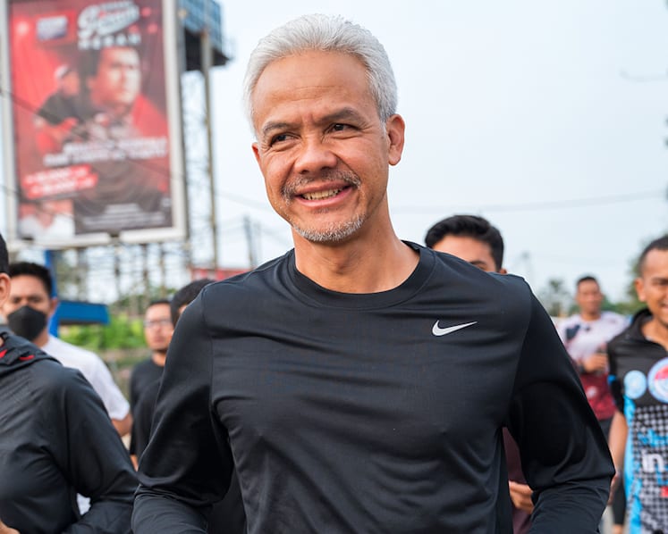 Avid marathoner Ganjar Pranowo laces up running shoes to go the distance in race to be Indonesia’s eighth president