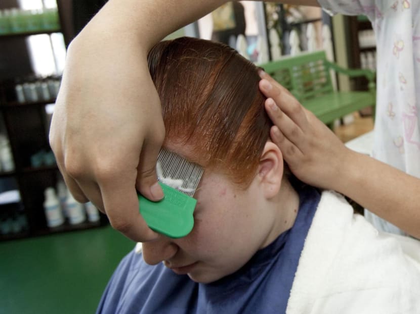 How to (calmly) address head lice