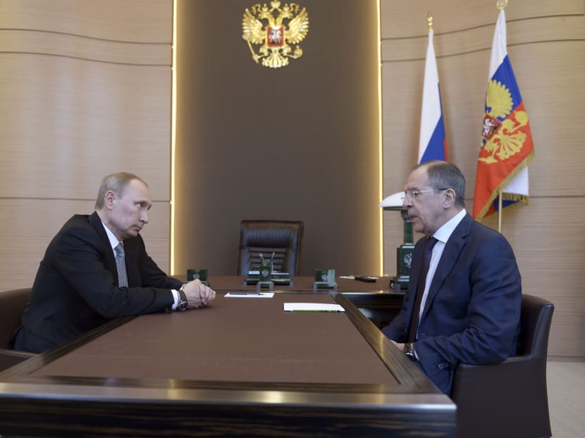 Russia's President Vladimir Putin meets with Foreign Minister Sergei Lavrov at the Bocharov Ruchei state residence in Sochi. Photo: REUTERS