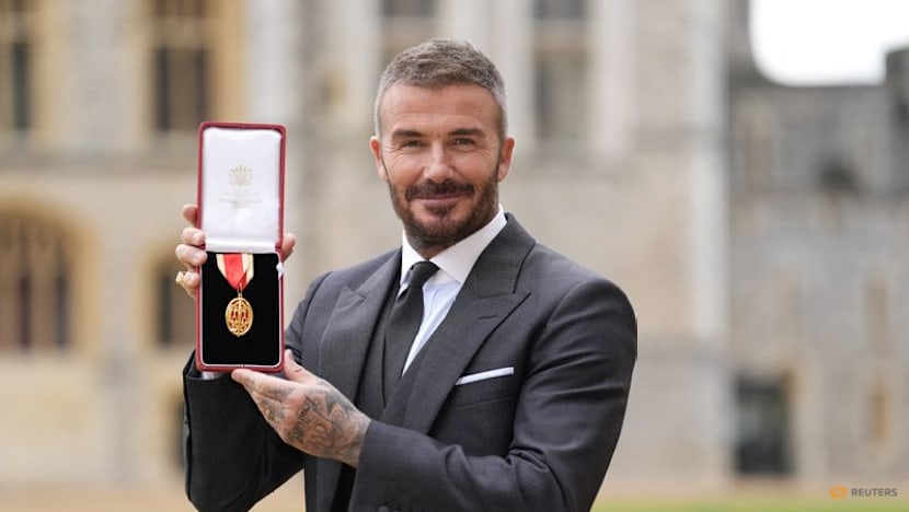 David Beckham knighted for services to sport and charity
