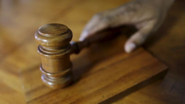 密谋窃取美国商业秘密 中国间谍被判坐牢20年